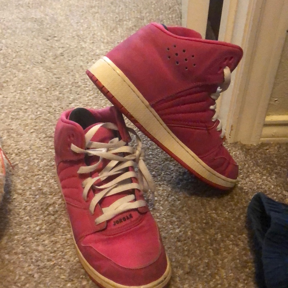 Woman’s pink Jordan’s